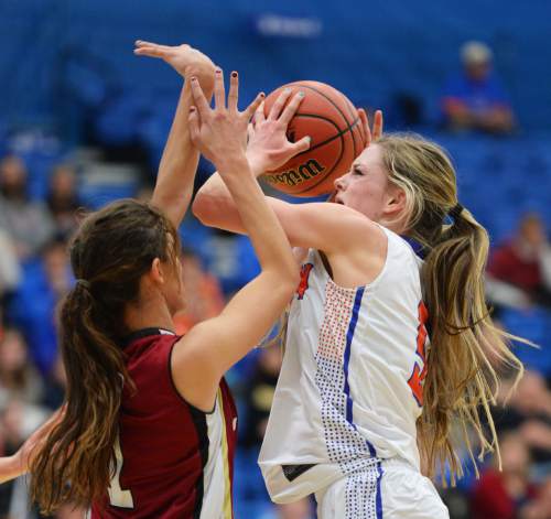 Steve Griffin  |  The Salt Lake Tribune

Timpview's Lyndie Haddock (5) shoots over Logan's Veronica Sullivan during opening round of the girl's 4A basketball state tournament at SLCC in Taylorsville, Tuesday, February 17, 2015.