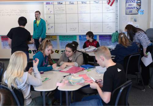 Al Hartmann  |  The Salt Lake Tribune
Over the past several years, Utah school districts have had to absorb higher pension and insurance costs, limiting how far per-pupil spending can go. Ninth-grade students in Tami Ewell's language arts class at Copper Mountain Middle School in Herriman work on a sentence structure lesson on Wednesday, Jan. 29, 2014.