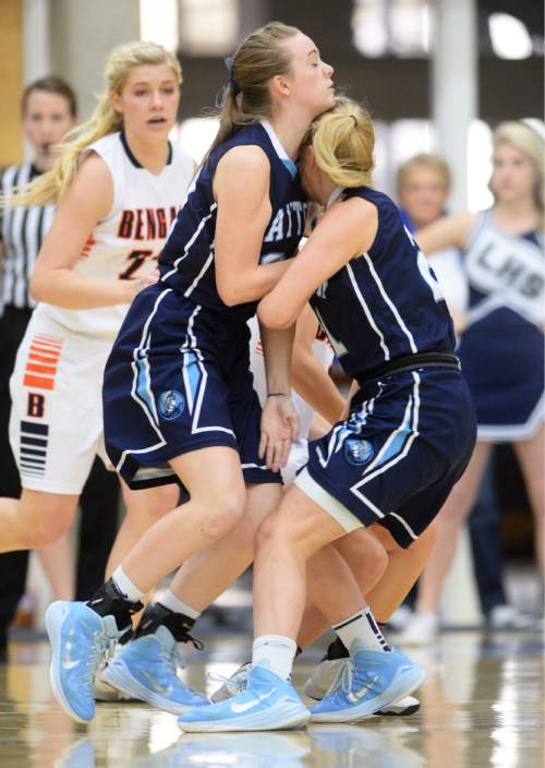 Steve Griffin  |  The Salt Lake Tribune

Layton's Joy Christensen (22) and Layton's Clara Wood (21) crash together as they go for a loose ball during second round game against Brighton of the girl's 5A basketball state tournament at SLCC in Taylorsville, Wednesday, February 18, 2015.
