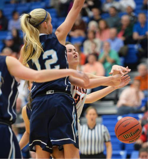 Steve Griffin  |  The Salt Lake Tribune

Brighton's Jade Summerhays (31) gets fouled by Brighton's Dani Barton (12) during second round game of the girl's 5A basketball state tournament at SLCC in Taylorsville, Wednesday, February 18, 2015.