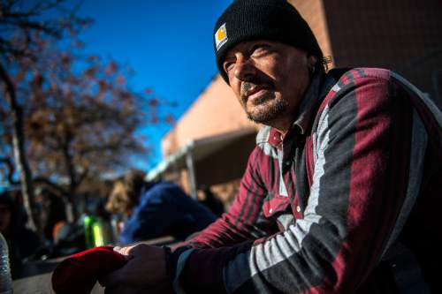 Chris Detrick  |  The Salt Lake Tribune
Glen Stokes sits outside the Bishop Weigand Homeless Day Center Tuesday December 23, 2014. Stokes thinks the Road Home should remain at its current location due to its close proximity to the train and bus station and it is within the free fare zone of Trax.