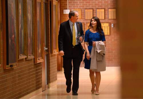 Leah Hogsten  |  The Salt Lake Tribune
Jay S. Bybee,  walks the halls of the Quinney College of Law with his daughter Alyssa Bybee. Bybee, a judge on the U.S. Court of Appeals for the 9th Circuit, gave a lecture to University of Utah law students titled "A Constitution We are Cofounding: Some Observations on the Constitution as Written and the Constitution as Taught" Thursday, February 19, 2015 at the SJ Quinney College of Law.