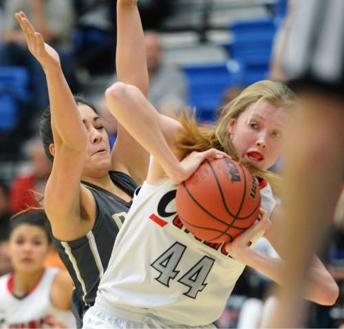 Steve Griffin  |  The Salt Lake Tribune

American Fork's Maile Richardson (44) uses her elbow to keep American Fork's Colleen Katoa (33) away from the ball during second round game in the girl's 5A basketball state tournament at SLCC in Taylorsville, Wednesday, February 18, 2015.