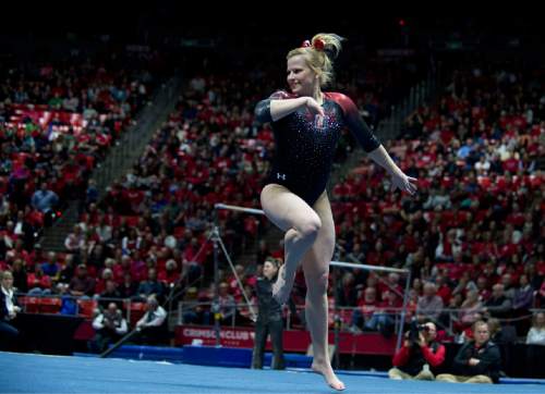 Lennie Mahler  |  The Salt Lake Tribune
Tory Wilson scores a 9.850 on her floor routine during a super meet at the Huntsman Center on Friday, Jan. 16, 2015.