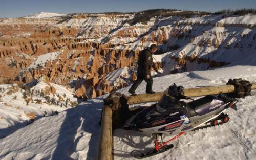Lawrence Twitchell, a state parks trails groomer for the Cedar Mountain Complex in southern Utah, takes in the scenic overlook of Point Supreme in the Cedar Breaks National Monument.   Photo by Francisco Kjolseth/The Salt Lake Tribune 12/21/2004