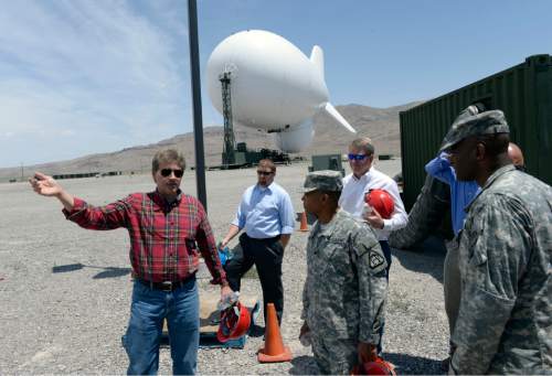 Al Hartmann  |  The Salt Lake Tribune
Officials from Raytheon and U.S Army battery tour the JLENS a last time at Utah Test and Training Range Tuesday June 10.    The JLENS which is 74 meters long will be moved from Utah to the Aberdeen Proving Ground in Maryland to integrate with NORAD.