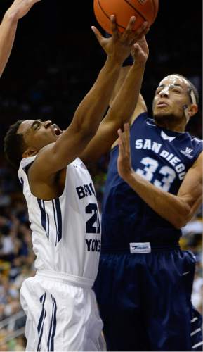 Francisco Kjolseth  |  The Salt Lake Tribune 
Anson Winder of BYU battles Jito Kok of San Diego for a shot at the basket in game action at the Marriott Center in Provo on Thursday, Feb. 19, 2015.