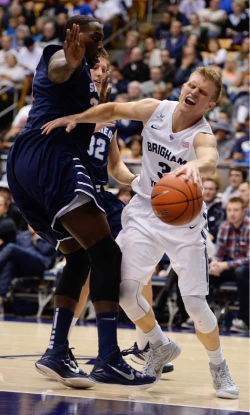 Francisco Kjolseth  |  The Salt Lake Tribune 
Tyler Haws finds stiff opposition from San Diego in game action at the Marriott Center in Provo on Thursday, Feb. 19, 2015.