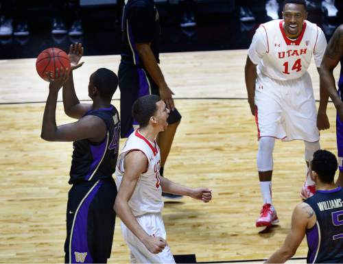 Scott Sommerdorf   |  The Salt Lake Tribune
Utah Utes F Brekkott Chapman (0) yells after scoring during first half play. His team mate, Utah Utes G/F Dakarai Tucker, right, smiles as Chapman yells. Utah beat Washington 77-56 at the Hunstman Center, Sunday, January 25, 2015.