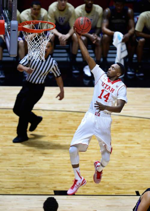 Scott Sommerdorf   |  The Salt Lake Tribune
Utah Utes G/F Dakarai Tucker (14) goes up for two easy points out of his 19 points as Utah beat Washington 77-56 at the Hunstman Center, Sunday, January 25, 2015.