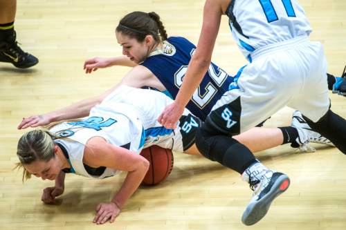 Chris Detrick  |  The Salt Lake Tribune
Sky View's Alyssa Walker (13) and Skyline's Kyla Paulus (22) dive for the ball during the 4A State Championship game at Salt Lake Community College Lifetime Activities Center  Saturday February 21, 2015.