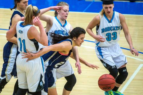 Chris Detrick  |  The Salt Lake Tribune
Sky View's Lindsey Jensen (11) Skyline's Olivia Elliss (24) Sky View's Abigail Harper (25) and Skyview's Tegan Goldman (33) go for the ball during the 4A State Championship game at Salt Lake Community College Lifetime Activities Center  Saturday February 21, 2015.
