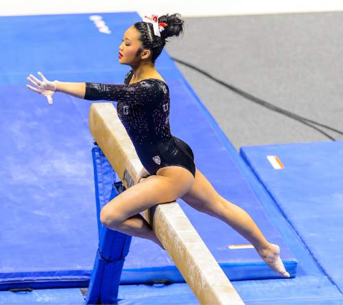 Trent Nelson  |  The Salt Lake Tribune
Utah's Kari Lee on the beam as the University of Utah Utes host Stanford, college gymnastics at the Huntsman Center in Salt Lake City, Saturday February 21, 2015.