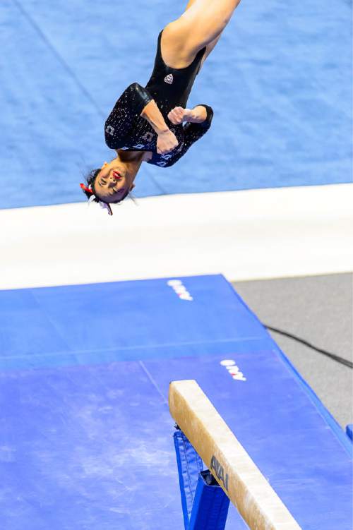 Trent Nelson  |  The Salt Lake Tribune
Utah's Kari Lee on the beam as the University of Utah Utes host Stanford, college gymnastics at the Huntsman Center in Salt Lake City, Saturday February 21, 2015.