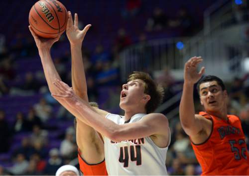 Steve Griffin  |  The Salt Lake Tribune

American Fork's Dallin Harley (44) dips under the Brighton defense during the opening round of the boy's 5A basketball state tournament game at the Dee Events Center in Ogden, Monday, February 23, 2015.