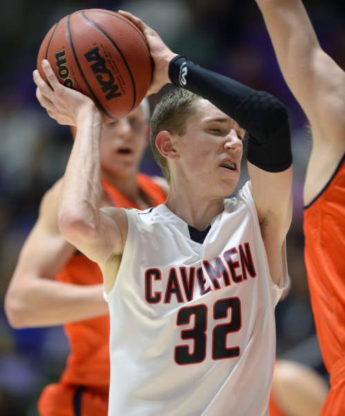 Steve Griffin  |  The Salt Lake Tribune

American Fork's Spencer Johnson (32) can't penetrate the Brighotn defense  during the opening round of the boy's 5A basketball state tournament game at the Dee Events Center in Ogden, Monday, February 23, 2015.