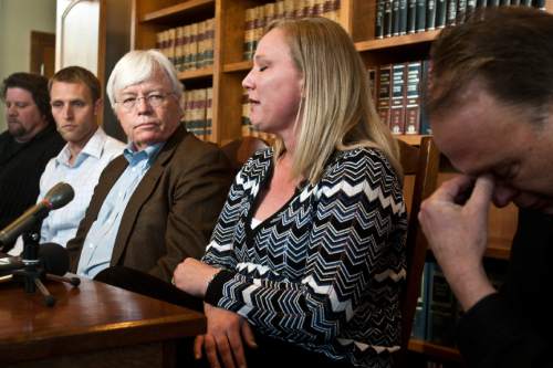 Chris Detrick |  Tribune file photo 
Kevan Francis, attorney Tyler Young, attorney Allen Young, Rebecca Ives and Tim Mulvey during a press conference at Young Kester Black and Jube law firm in Provo Wednesday May 4, 2011.