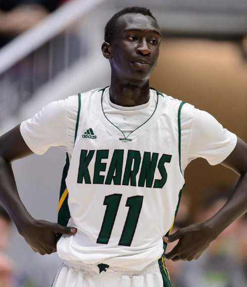 Trent Nelson  |  The Salt Lake Tribune
Kearns's Buay Kuajian (11) reacts to a ten point deficit in the first half as Kearns faces Timpanogos High School in the state 4A boys basketball tournament at the Dee Events Center in Ogden, Tuesday February 24, 2015.