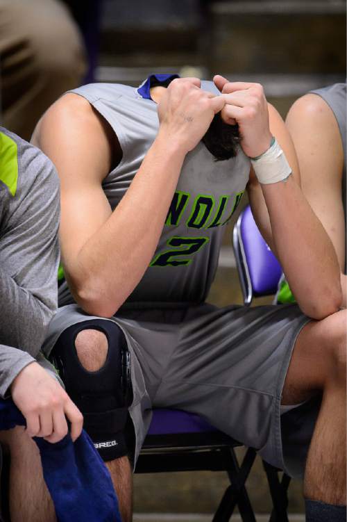 Trent Nelson  |  The Salt Lake Tribune
Timpanogos's Caiden Brown (2) on the bench after fouling out as Kearns faces Timpanogos High School in the state 4A boys basketball tournament at the Dee Events Center in Ogden, Tuesday February 24, 2015.