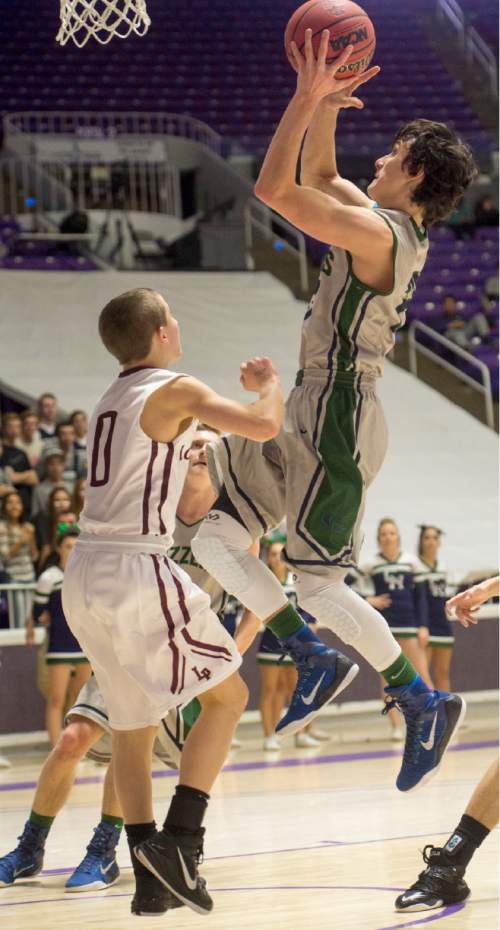 Rick Egan  |  The Salt Lake Tribune

Copper Hills guard Preston Sanchez (23) scores as Lone Peak forward Chantry Ross defends,  in 5A Boys Basketball StateTournament action, Lone Peak vs Copper Hills, at the Dee Event Center, Monday, February 23, 2015