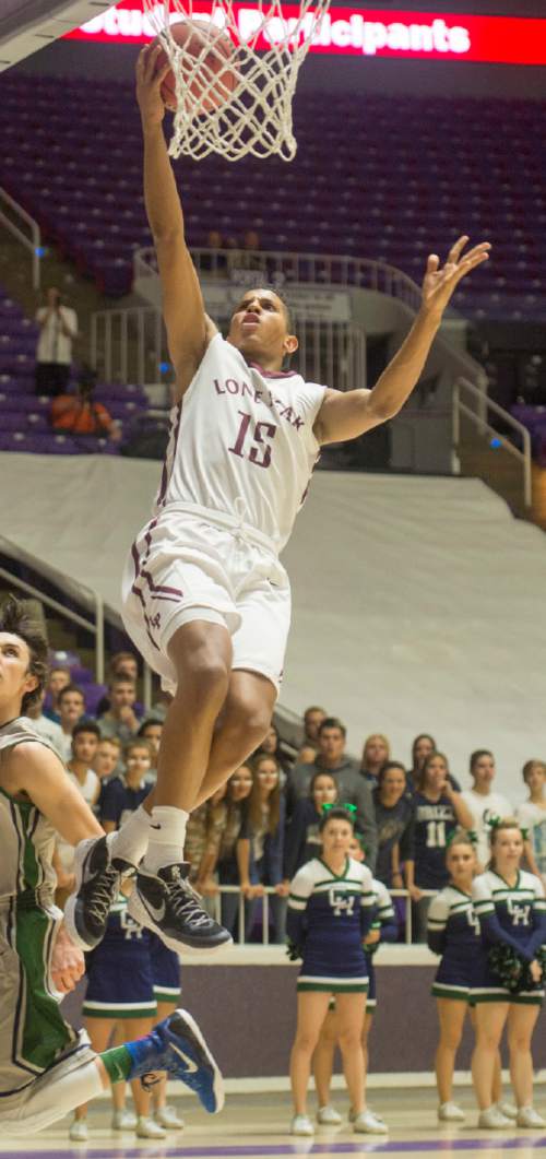 Rick Egan  |  The Salt Lake Tribune

Lone Peak guard Franklin Jackson (15) scores on an easy lay-up, in 5A Boys Basketball StateTournament action, Lone Peak vs Copper Hills, at the Dee Event Center, Monday, February 23, 2015