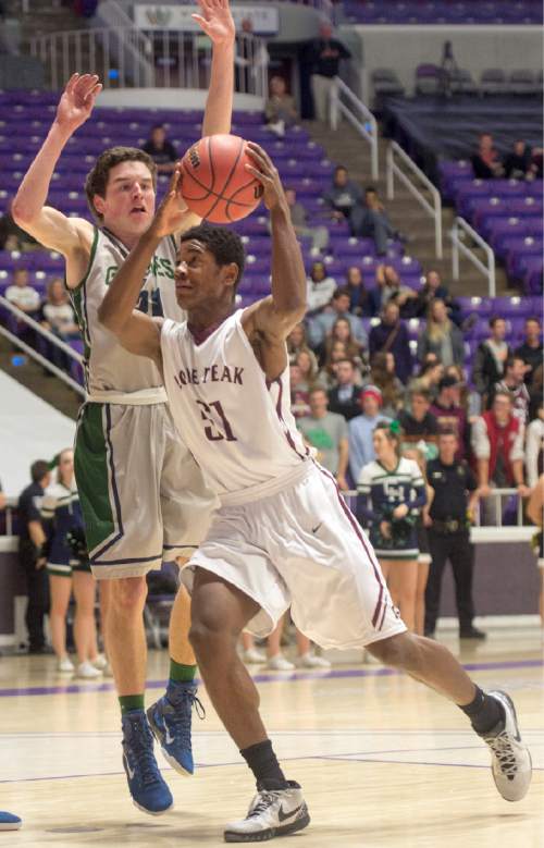 Rick Egan  |  The Salt Lake Tribune

Lone Peak guard Christian Popoola (51) gets past Copper Hills center Porter Hawkins (11) in 5A Boys Basketball StateTournament action, Lone Peak vs Copper Hills, at the Dee Event Center, Monday, February 23, 2015