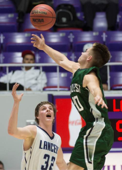 Rick Egan  |  The Salt Lake Tribune

Layton forward Cody Edwards (32) and Hillcrest guard Kale Gould (20) go for a loose ball, in 5A Boys Basketball State Tournament action, Layton vs. Hillcrest, at the Dee Event Center, Monday, February 23, 2015