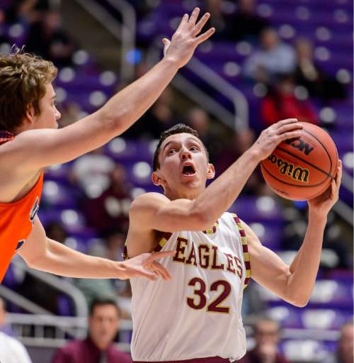 Trent Nelson  |  The Salt Lake Tribune
Maple Mountain's Bryson Anderson (32) goes to the basket, defended by Mountain Crest's Tanner Schwab (1), as Maple Mountain faces Mountain Crest High School in the state 4A boys basketball tournament at the Dee Events Center in Ogden, Tuesday February 24, 2015.