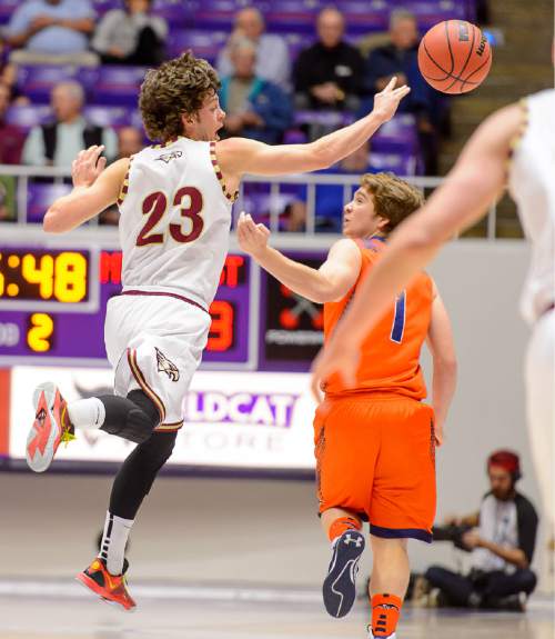 Trent Nelson  |  The Salt Lake Tribune
Maple Mountain's Kade Poulsen (23) knocks the ball away from Mountain Crest's Tanner Schwab (1), as Maple Mountain faces Mountain Crest High School in the state 4A boys basketball tournament at the Dee Events Center in Ogden, Tuesday February 24, 2015.