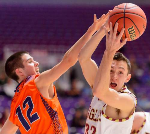 Trent Nelson  |  The Salt Lake Tribune
Maple Mountain's Bryson Anderson (32) pulls down a rebound, ahead of Mountain Crest's Thomas Albrechtsen (12), as Maple Mountain faces Mountain Crest High School in the state 4A boys basketball tournament at the Dee Events Center in Ogden, Tuesday February 24, 2015.