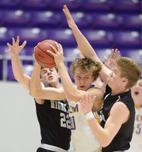 Steve Griffin  |  The Salt Lake Tribune

Highland's Maxwell Wilson (22) and Brandon Warr (23) trap Orem's Wilhelm Clark during opening round of the boy's 4A basketball state tournament game between at the Dee Event Center in Ogden, Tuesday, February 24, 2015.