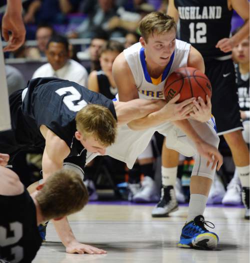 Steve Griffin  |  The Salt Lake Tribune

Orem's Hayden Young (3) grabs the ball and Highland's Ryan Lambson's (2) aren as he secures the ball during opening round of the boy's 4A basketball state tournament game at the Dee Event Center in Ogden, Tuesday, February 24, 2015.