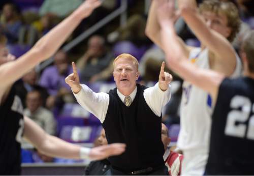 Steve Griffin  |  The Salt Lake Tribune

Highland head coach Jim Boyce calls out a play during opening round of the boy's 4A basketball state tournament game against Orem at the Dee Event Center in Ogden, Tuesday, February 24, 2015.