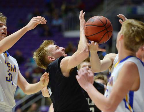 Steve Griffin  |  The Salt Lake Tribune

Highland's Ryan Lambson (2) loses the ball in traffic during opening round of the boy's 4A basketball state tournament game against  Orem at the Dee Event Center in Ogden, Tuesday, February 24, 2015.