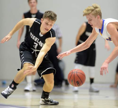 Steve Griffin  |  The Salt Lake Tribune

Highland's Spencer Moncur (3) knocks the ball away from Orem's Wilhelm Clark during opening round of the boy's 4A basketball state tournament game at the Dee Event Center in Ogden, Tuesday, February 24, 2015.