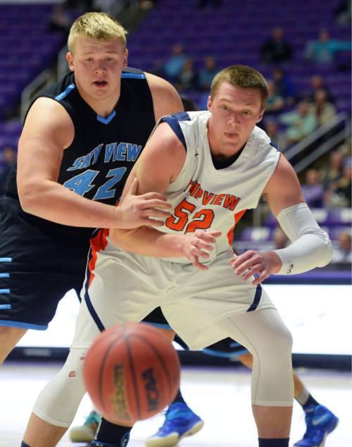 Steve Griffin  |  The Salt Lake Tribune

Sky View's Tyler Downs, left, tries to deny the ball as Timpview's AJ Bollinger (52) fights for position during opening round of the boy's 4A basketball state tournament game at the Dee Event Center in Ogden, Tuesday, February 24, 2015.