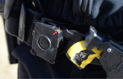 Francisco Kjolseth  |  The Salt Lake Tribune 
West Valley City Police Department will soon deploy 190 body cameras for use by sworn officers. The battery pack for the camera which is worn on the belt keeps the camera in standby mode, recording video continuously in a 30 second loop until the recorder is activated by the officer at which point the 30 second loop is captured and sound begins to record as well.