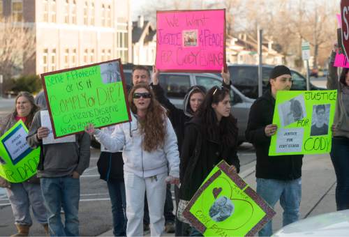 Rick Egan  |  The Salt Lake Tribune

Supporters of Cody Evans shout at Provo City Police cars as they leave the Police Station, during a rally in Provo, Wednesday, February 25, 2015