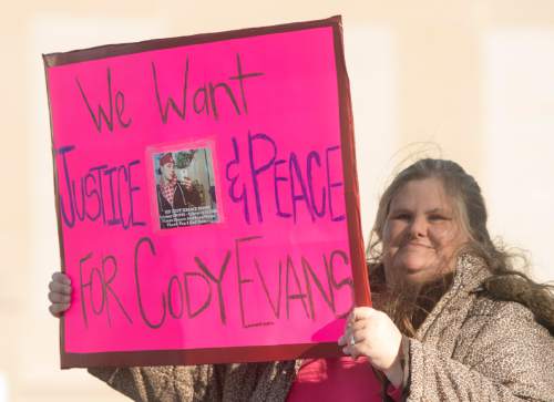 Rick Egan  |  The Salt Lake Tribune

Emily Stone holds a sign along with orhter supporters of Cody Evans, on the corner of 500 West and Center street, during a rally in Provo, Wednesday, February 25, 2015