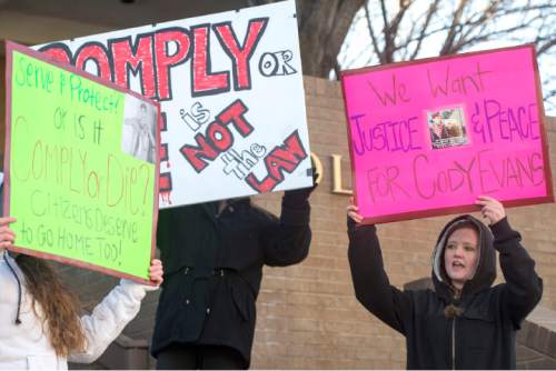 Rick Egan  |  The Salt Lake Tribune

Taysha Mace stands on the steps of the Provo Police Station along with other supporters of Cody Evans, during a rally in Provo, Wednesday, February 25, 2015