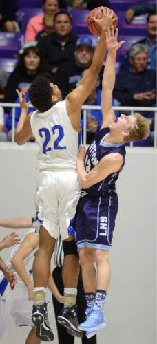 Steve Griffin  |  The Salt Lake Tribune

Bingham's Yoeli Libii (22) swipes a rebound from Layton's Dallin Watts  during quarterfinals of the boy's 5A basketball state tournament game at the Dee Event Center in Ogden, Wednesday, February 25, 2015.