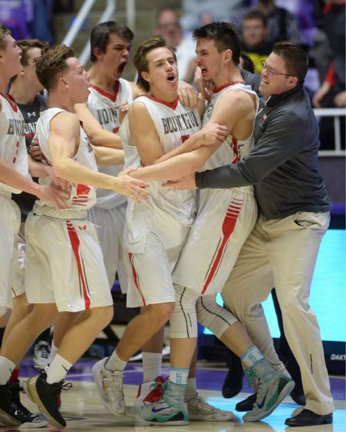 Steve Griffin  |  The Salt Lake Tribune

Teammates mob Bountiful's Zachary Seljaas (1) after he nailed a jumper with no time left on the clock giving the Braves a last second victory over Murray during opening round of the boy's 4A basketball state tournament at the Dee Event Center in Ogden, Tuesday, February 24, 2015.