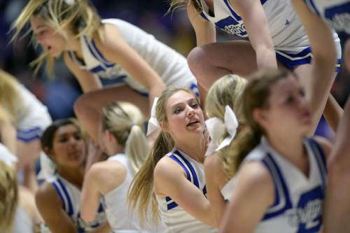 Steve Griffin  |  The Salt Lake Tribune

The Pleasant Grove cheer leaders entertain the crowd during quarterfinals of the boy's 5A basketball state tournament game between Davis and Pleasant Grove at the Dee Event Center in Ogden, Wednesday, February 25, 2015.