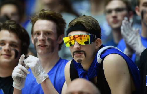 Steve Griffin  |  The Salt Lake Tribune

Pleasant Grove fans keep an eye on the action during quarterfinals of the boy's 5A basketball state tournament game agasint Davis at the Dee Event Center in Ogden, Wednesday, February 25, 2015.