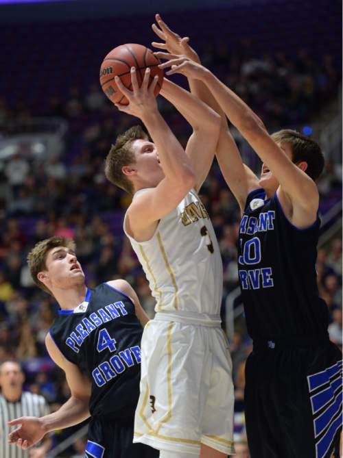 Steve Griffin  |  The Salt Lake Tribune

Davis's Landon Swartz (3) tries to score over Pleasant Grove's Brody Childs (30) during quarterfinals of the boy's 5A basketball state tournament game at the Dee Event Center in Ogden, Wednesday, February 25, 2015.