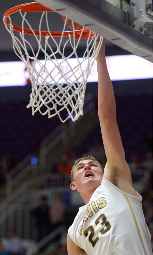 Steve Griffin  |  The Salt Lake Tribune

Davis's Benjamin Rigby (23) lays the ball in for two points during quarterfinals of the boy's 5A basketball state tournament game agasint Pleasant Grove at the Dee Event Center in Ogden, Wednesday, February 25, 2015.