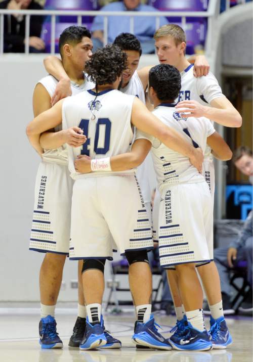 Steve Griffin  |  The Salt Lake Tribune

The Hunter starters huddle up at the start of the third quarter during quarterfinals of the boy's 5A basketball state tournament game against  Brighton at the Dee Event Center in Ogden, Wednesday, February 25, 2015.
