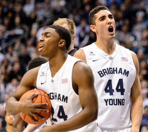Trent Nelson  |  The Salt Lake Tribune
Brigham Young Cougars guard Frank Bartley IV (24) and center Corbin Kaufusi (44) protest a foul call as BYU hosts Gonzaga, men's college basketball at the Marriott Center in Provo, Saturday December 27, 2014.