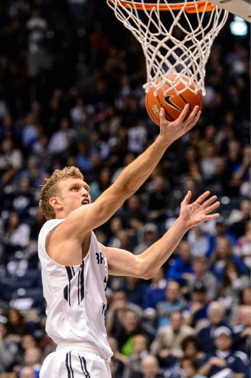 Trent Nelson  |  The Salt Lake Tribune
Brigham Young Cougars guard Tyler Haws (3) shoots the ball as BYU hosts Gonzaga, men's college basketball at the Marriott Center in Provo, Saturday December 27, 2014.