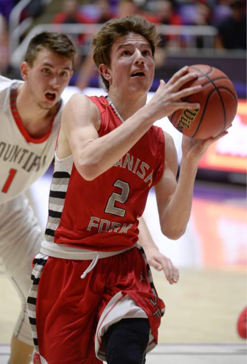 Francisco Kjolseth  |  The Salt Lake Tribune 
Spanish Fork's Taylor Anderson (2) drives the ball against Bountiful in 4A boys' hoops quarterfinal at the Dee Events Center in Ogden on Thursday, Feb. 26, 2015.